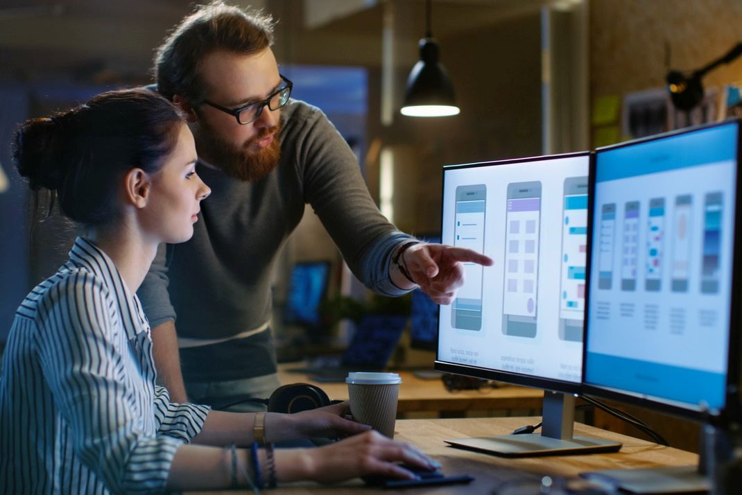 Digital Products Succeed in Competitive Markets Female UX Architect Has Discussion with Male Design Engineer, Th